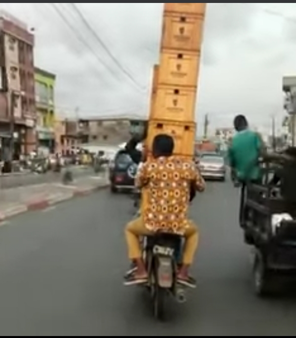 Origin of Crate Challenge in Africa - 2 men playing with Fire on the Road