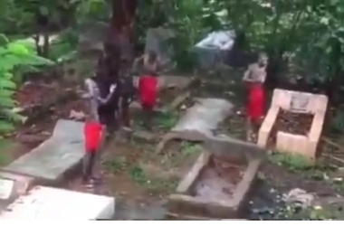VIDEO 3 Suspected Yahoo Boys Caught Bathing in Burial Ground